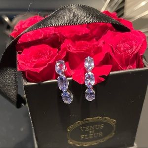 Tanzanite and sterling silver post earrings.  Never worn.